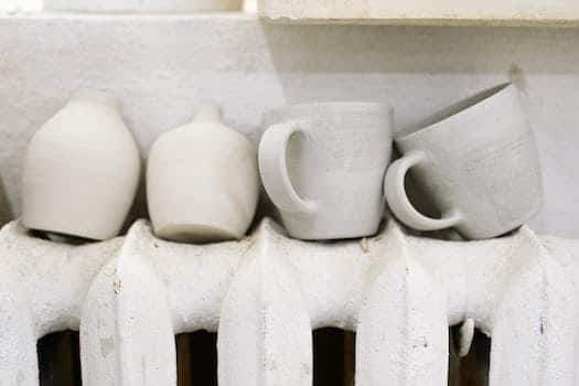 Clay Mugs Drying on a Radiator