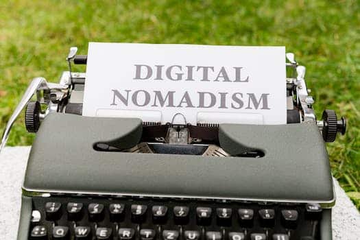 A typewriter with a paper that says digital nomadism